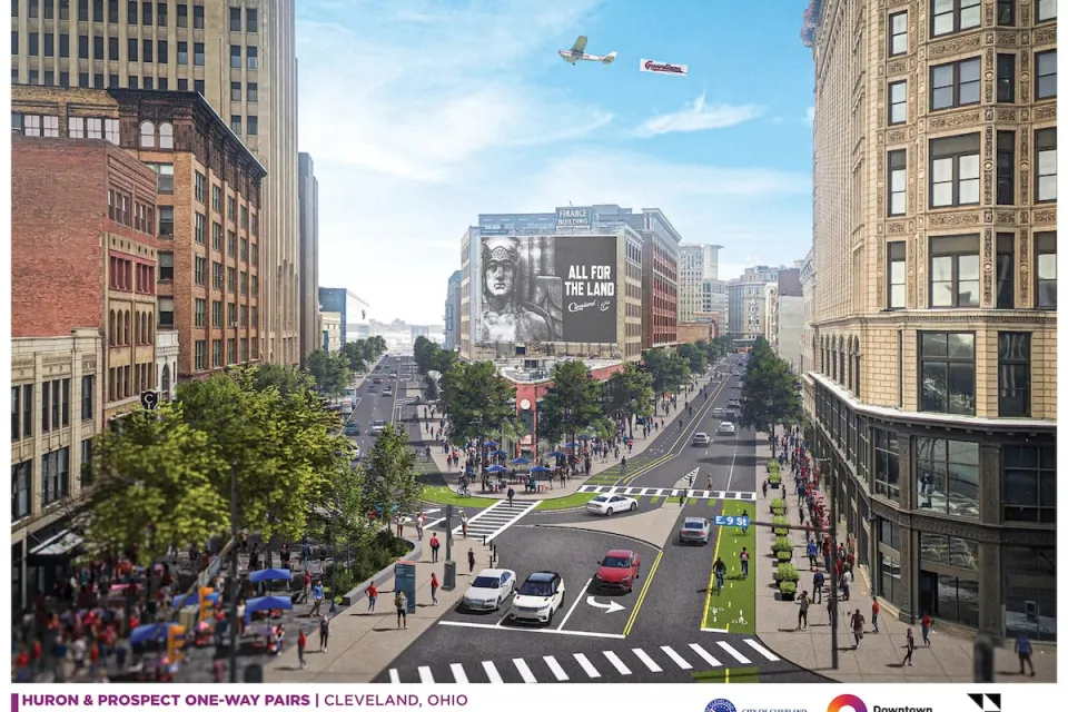 Rendering of protected bike lanes painted green in downtown Cleveland, Ohio with people and cars.